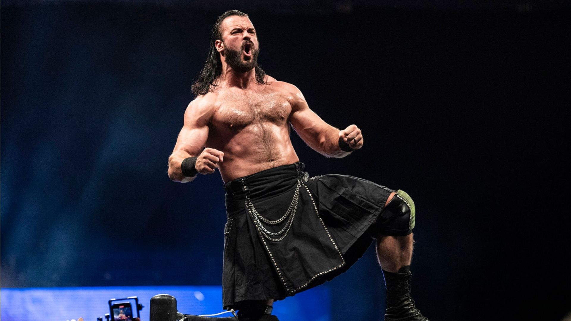 Drew McIntyre posing before a match.