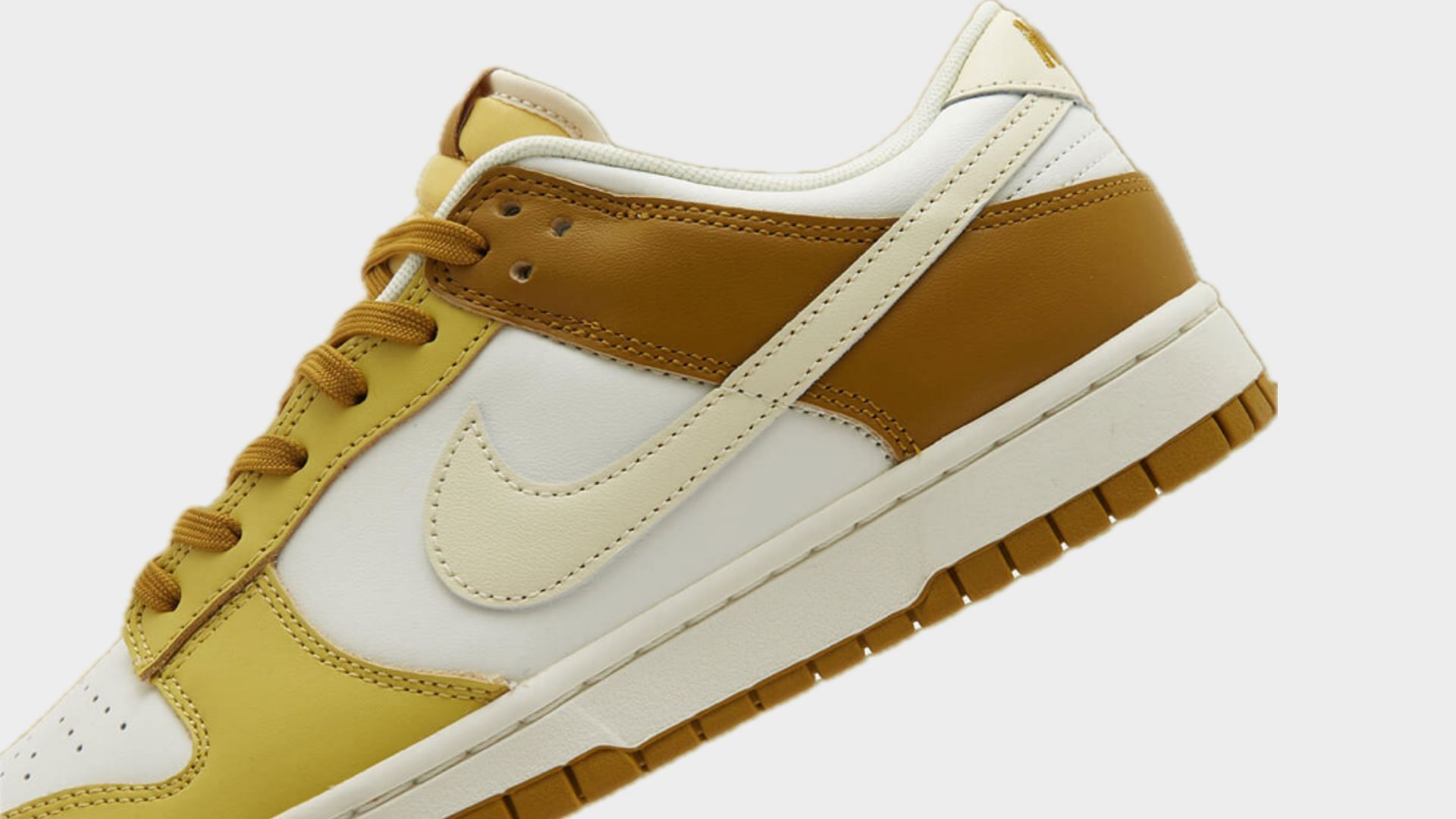 Take a closer look at the sides of this Nike Dunk Low sneaker (Image via JD Sports UK)