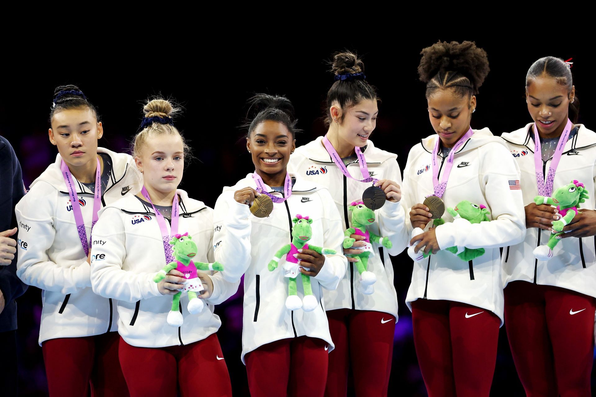 Simone Biles and Team USA with the gold medals at the 2023 World Artistic Gymnastics Championships.