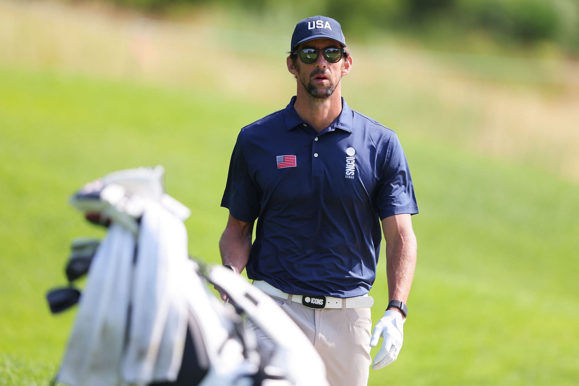 Michael Phelps looks on during Day Two of the ICON Series at Liberty National Golf Club