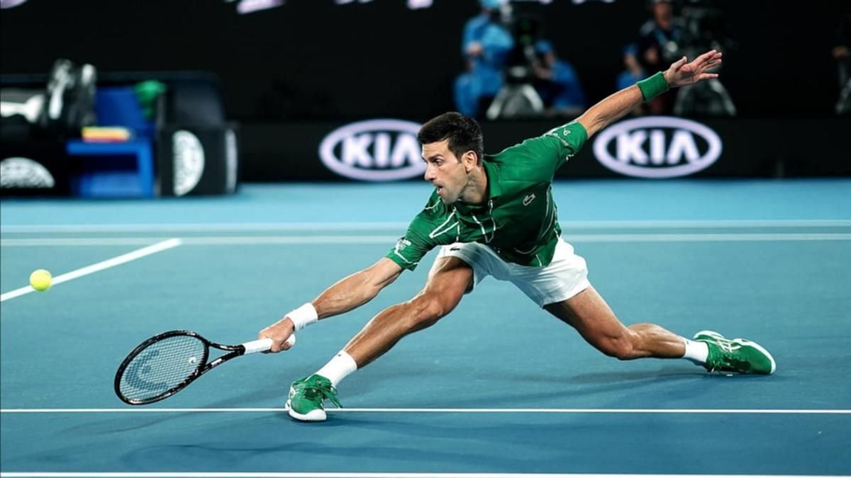 The Serb slides to chase down a shot at the 2020 Dubai Tennis Championships