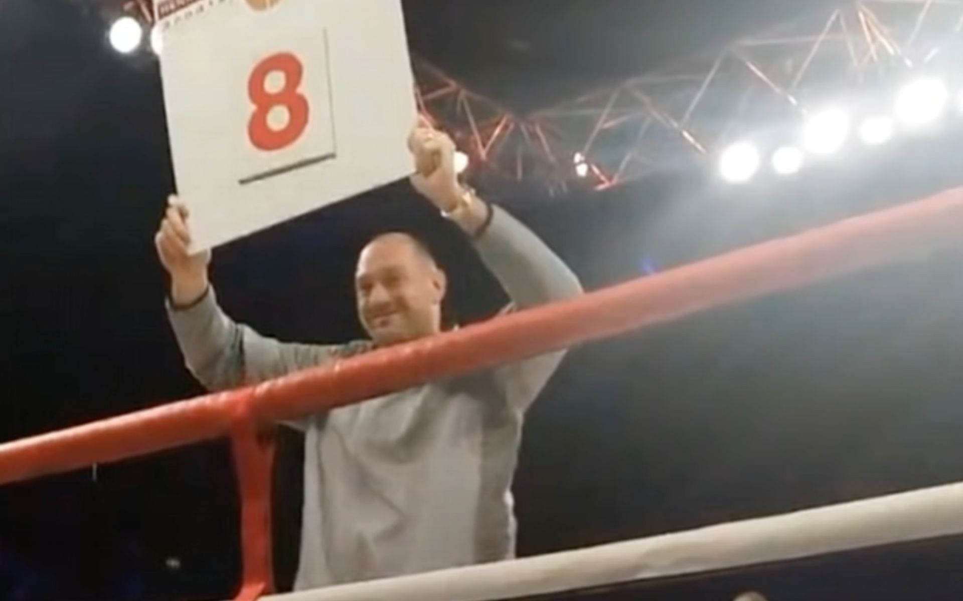 Tyson Fury posing as a ring girl at Wembley Arena (Image Courtesy - @SheldanKeay on X/Twitter)