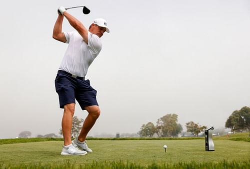 Bryson DeChambeau hitting a shot (Image via Getty).