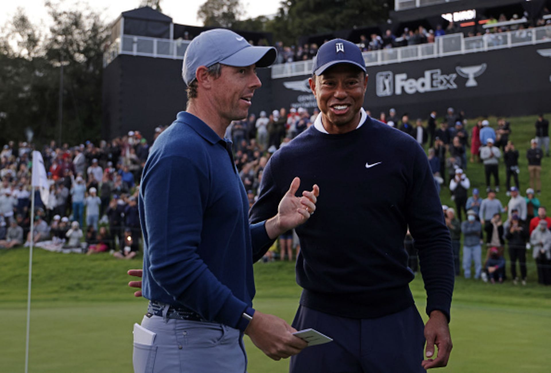 Tiger Woods and Rory McIlroy (Image via Getty).