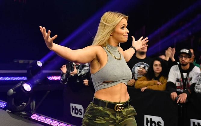 Paige VanZant spotted flat on the ground after sparring session with BJJ beauty