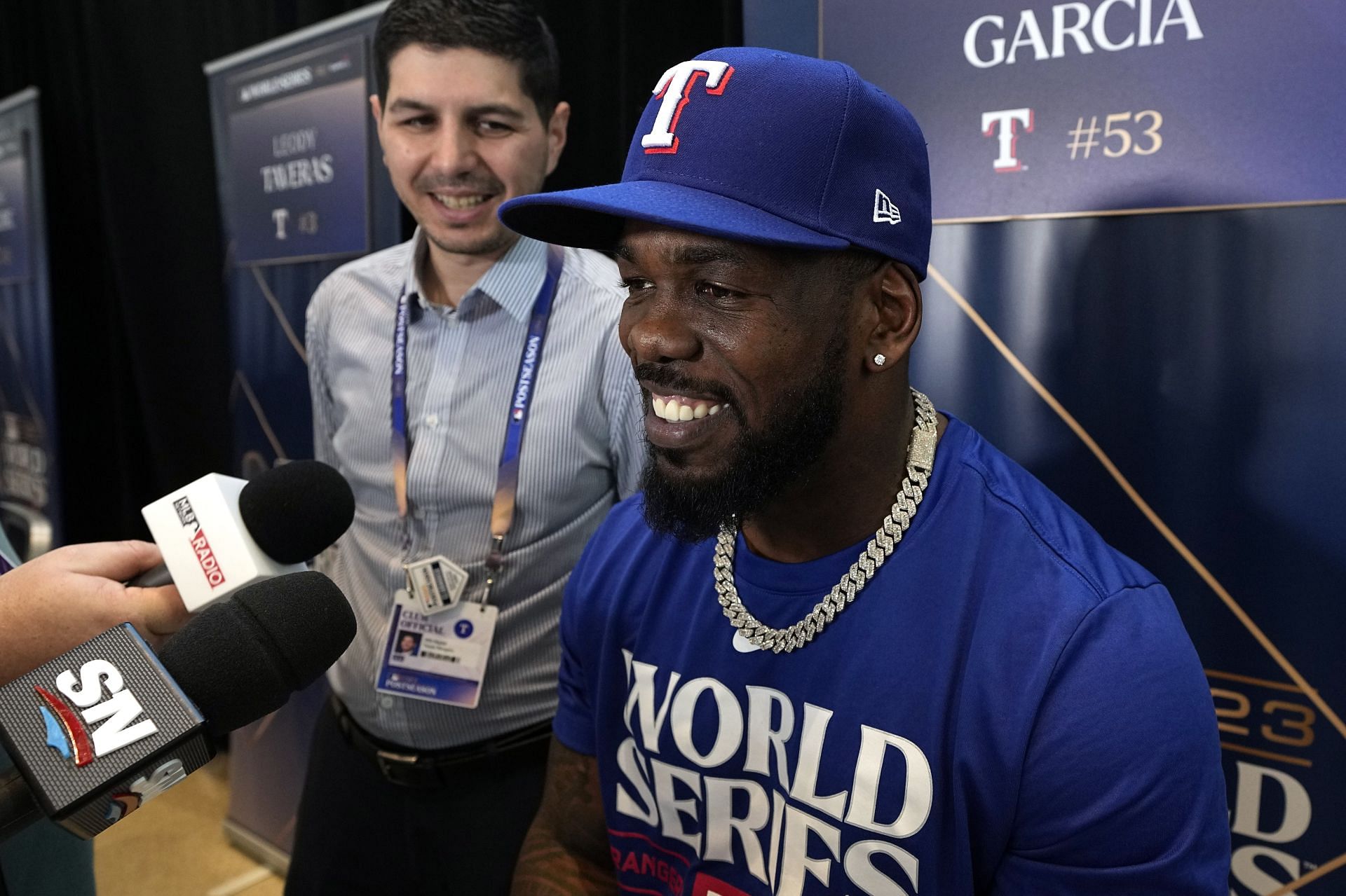 Texas Rangers right fielder Adolis Garcia answers a question during a World Series baseball media day