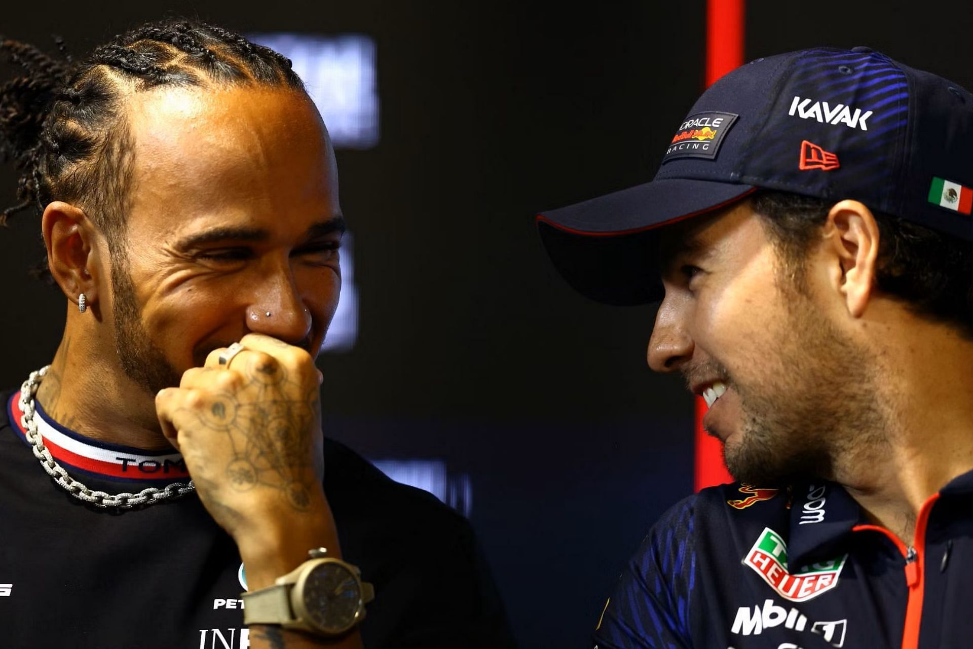 Lewis Hamilton talks with Sergio Perez in the Drivers Press Conference during previews ahead of the 2023 F1 Saudi Arabian Grand Prix. (Photo by Bryn Lennon/Getty Images)