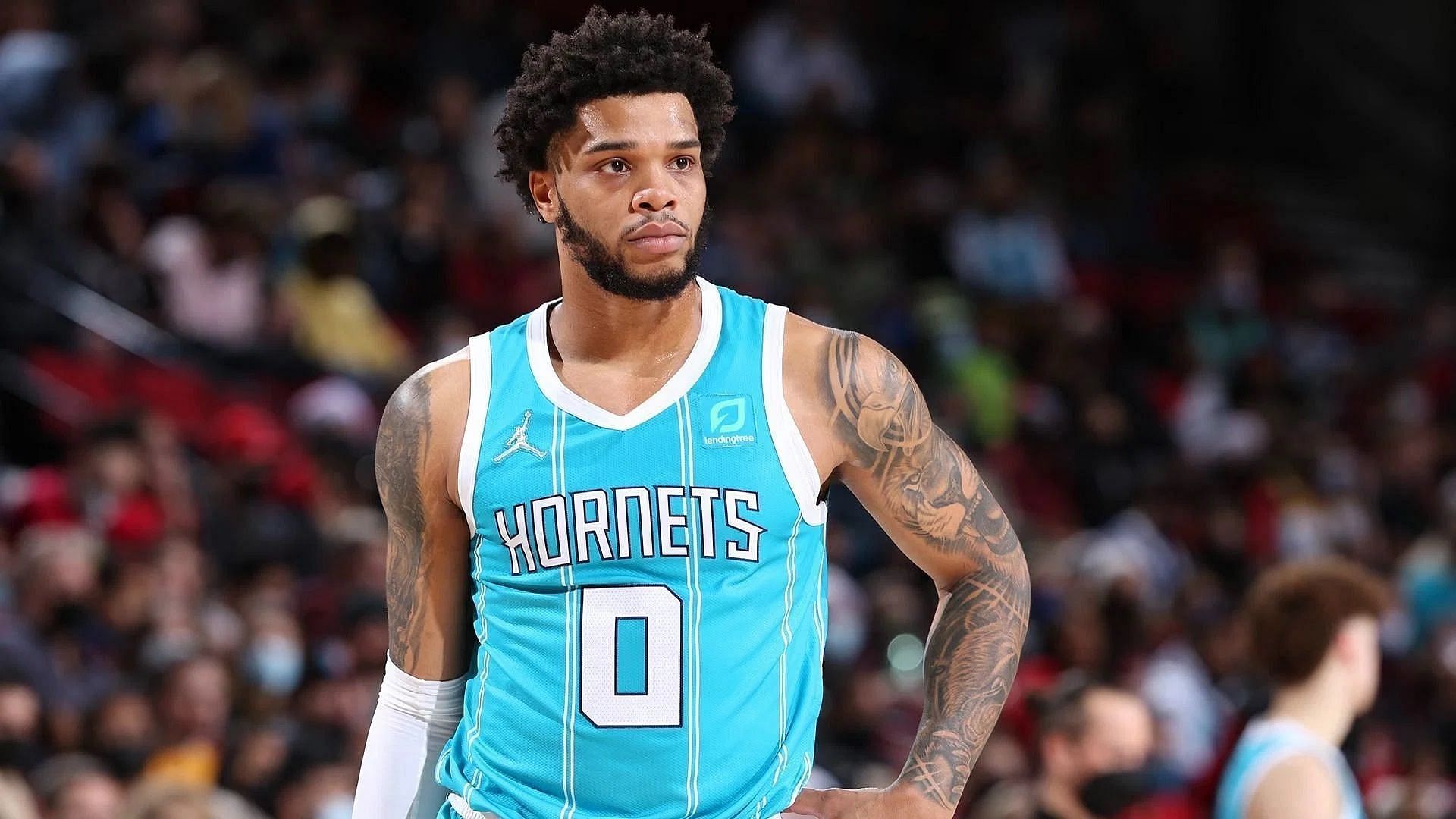 Charlotte Hornets forward Miles Bridges reportedly turned himself in to authorities after an arrest warrant was served to him in connection with a domestic violence case lodged against him last year.