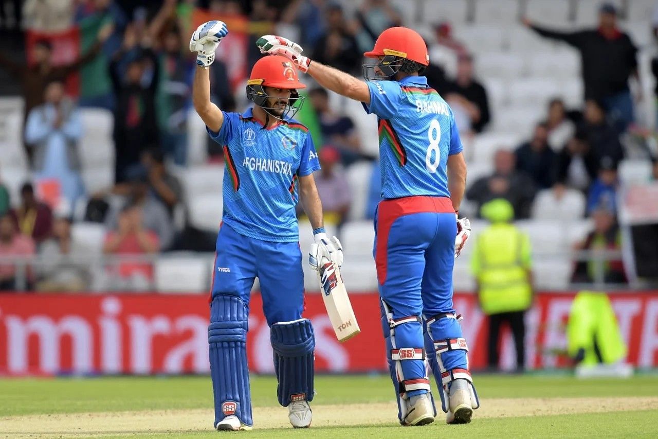 Rahmat Shah congratulating Imram Alikhil [Getty Images]