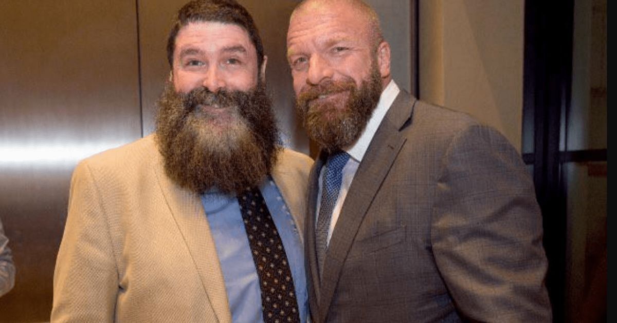 Former WWE Champions Mick Foley and Triple H.
