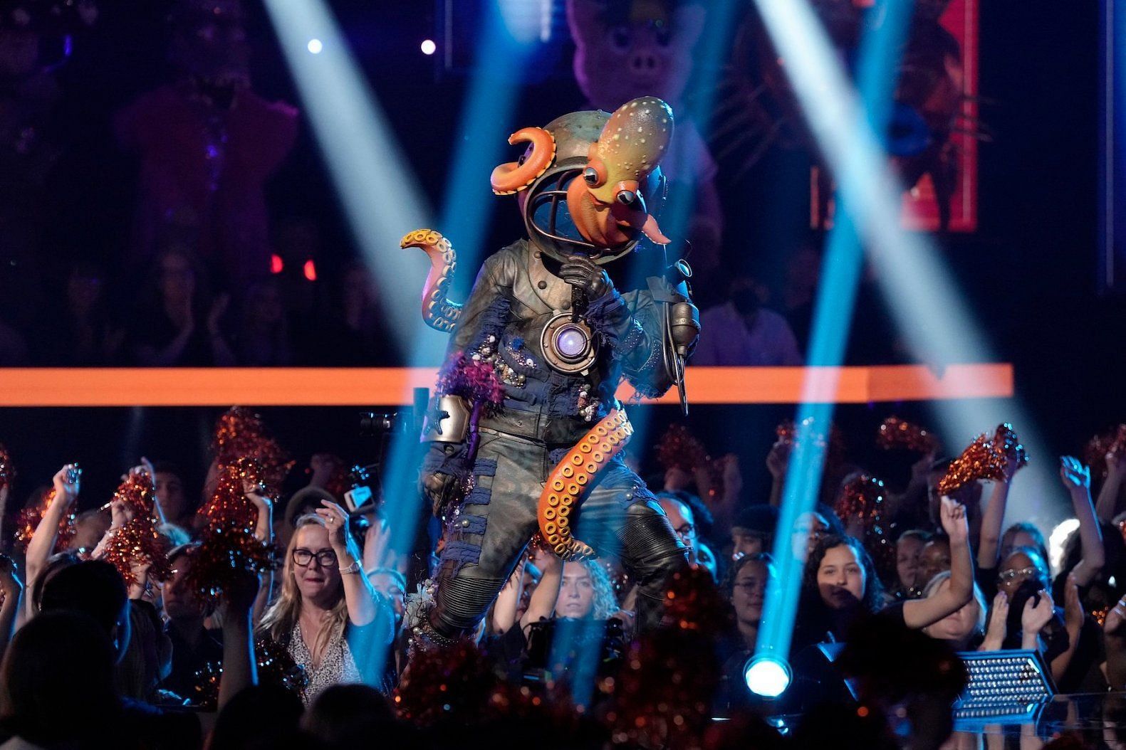A controversial Vanderpump Rules star was revealed as Diver in The Masked Singer. (Image via Fox)