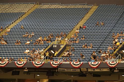 Fans watch amongst empty seats during Game 2 in an AL wild-card series between the Tampa Bay Rays and the Texas Rangers