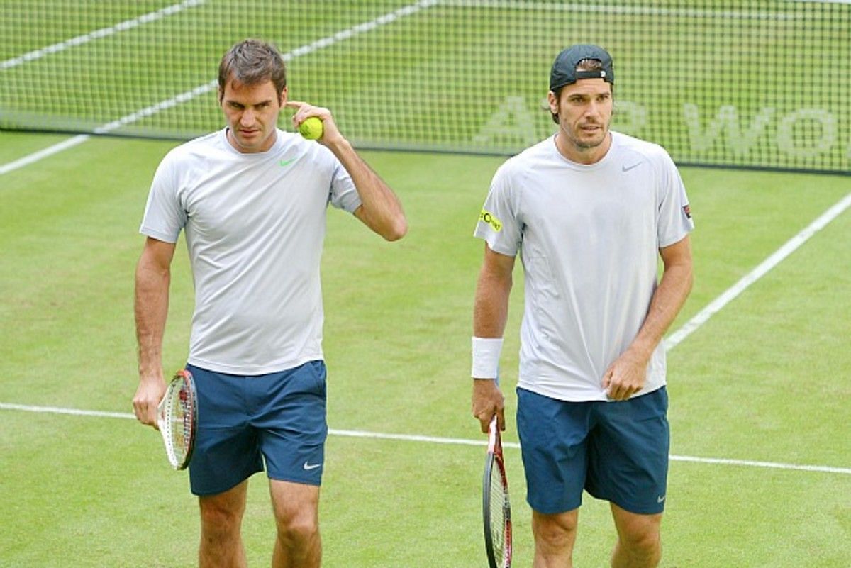 Roger Federer pictured with Tommy Haas at the 2013 Halle Open