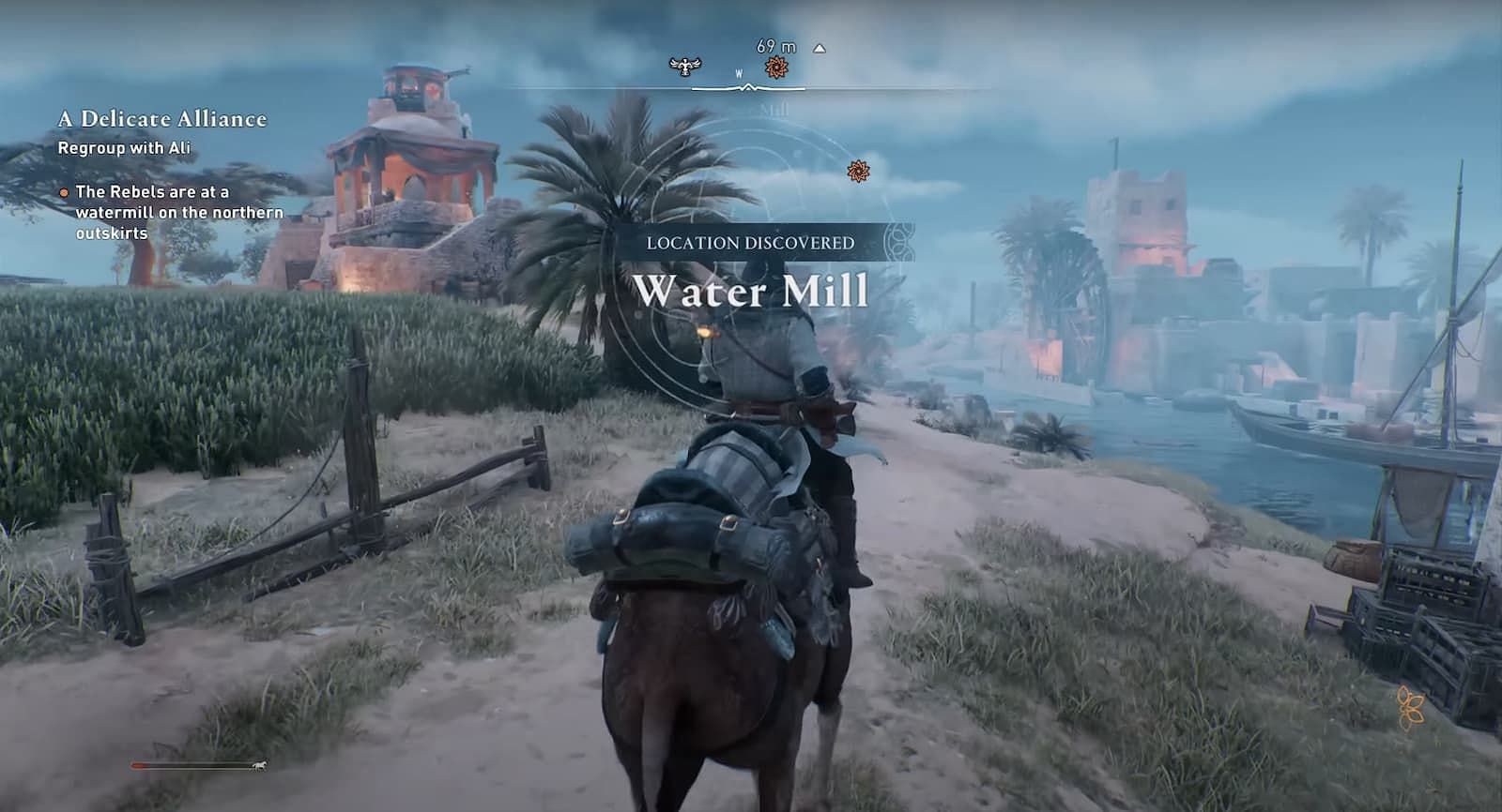 Ali and the rebels are hiding at a watermill (Image via Ubisoft/theRadBrad)