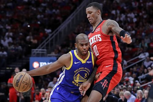 Golden State Warriors veteran point guard Chris Paul (left)