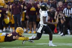 Shedeur Sanders taking back-to-back sacks is "to protect his completion percentage" claims anonymous Pac-12 coach; fans react to CFB theories
