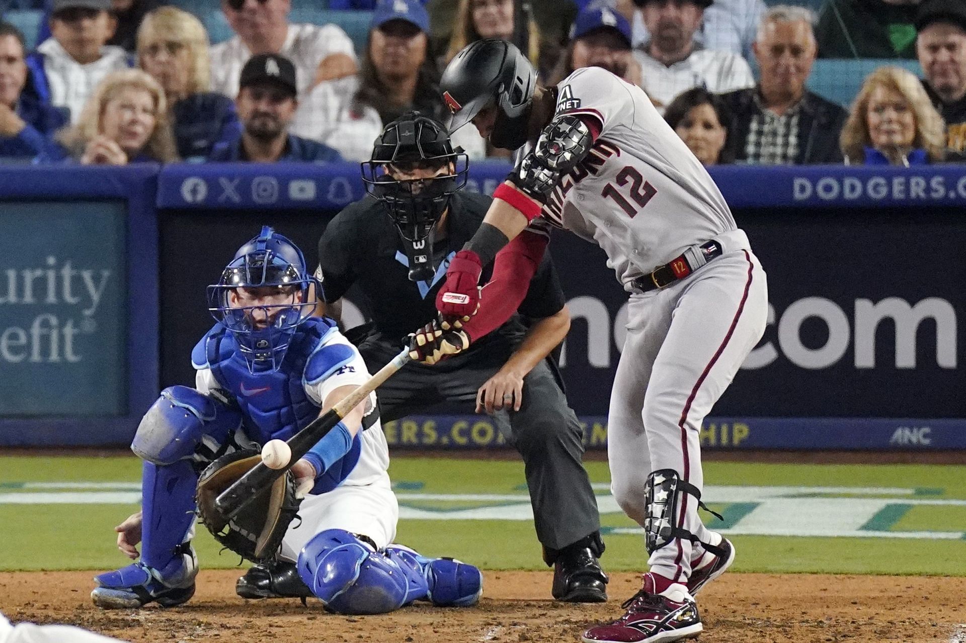 Arizona Diamondbacks&#039; Lourdes Gurriel Jr. hits a solo home run during the sixth inning at a baseball NL Division Series against the Los Angeles Dodgers, in Los Angeles