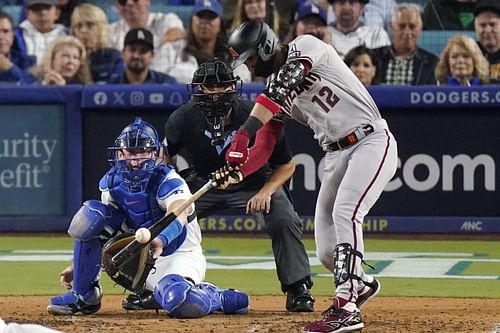 Arizona Diamondbacks' Lourdes Gurriel Jr. hits a solo home run during the sixth inning at a baseball NL Division Series against the Los Angeles Dodgers, in Los Angeles