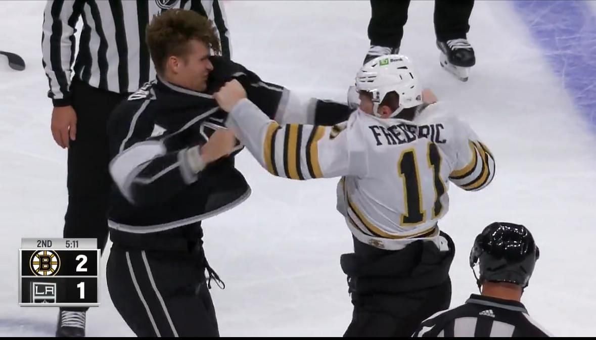 Trent Frederic of the Boston Bruins celebrates after scoring