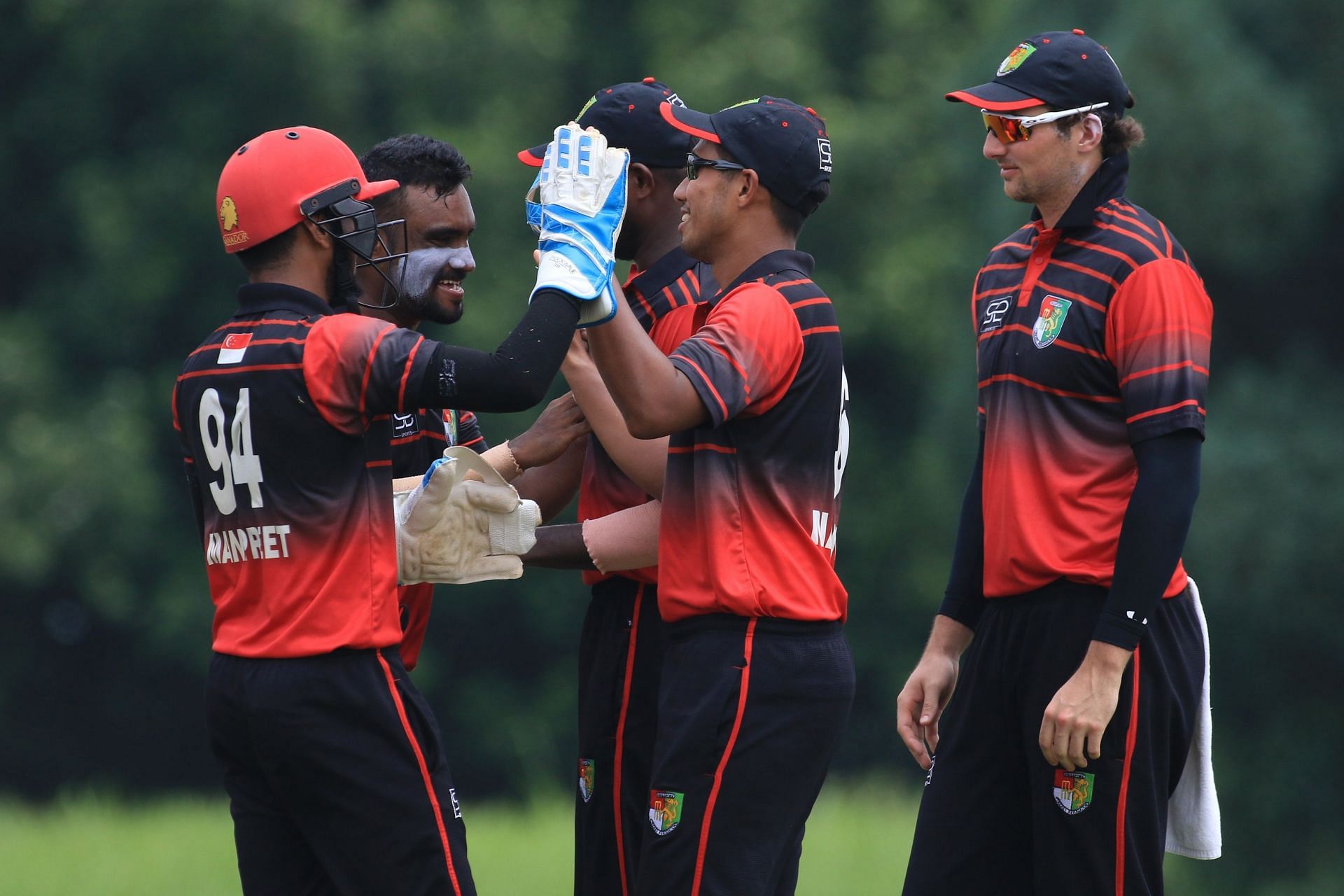 Singapore Cricket Team celebrates a wicket against Zimbabwe (Image Credits: ICC via&nbsp;Peter&nbsp;Lim/IDI)