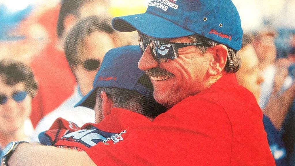 Dale Earnhardt hugs his son Dale Jr after the latter won his second consecutive NASCAR Xfinity Series Championship