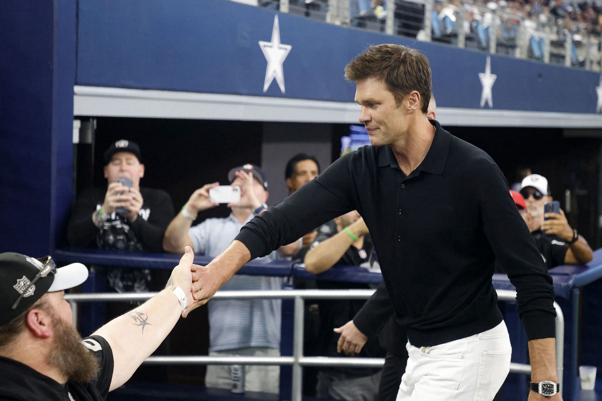 Tom Brady greets fans at Raiders vs Cowboys