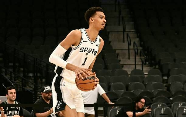 French basketball player Victor Wembanyama demonstrates his skills following a news conference introducing the Spurs 2023 Draft Class, at the AT&amp;T...