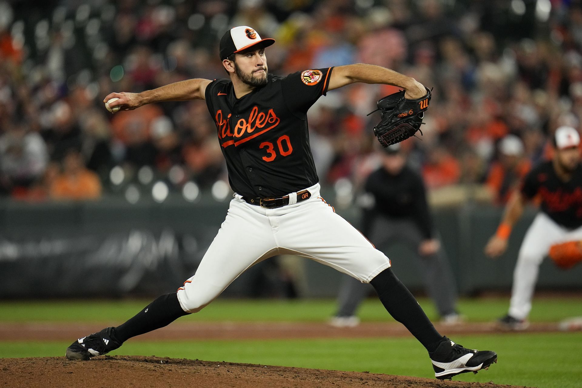 Baltimore Orioles starting pitcher Grayson Rodriguez throws to the Washington Nationals in Baltimore. 