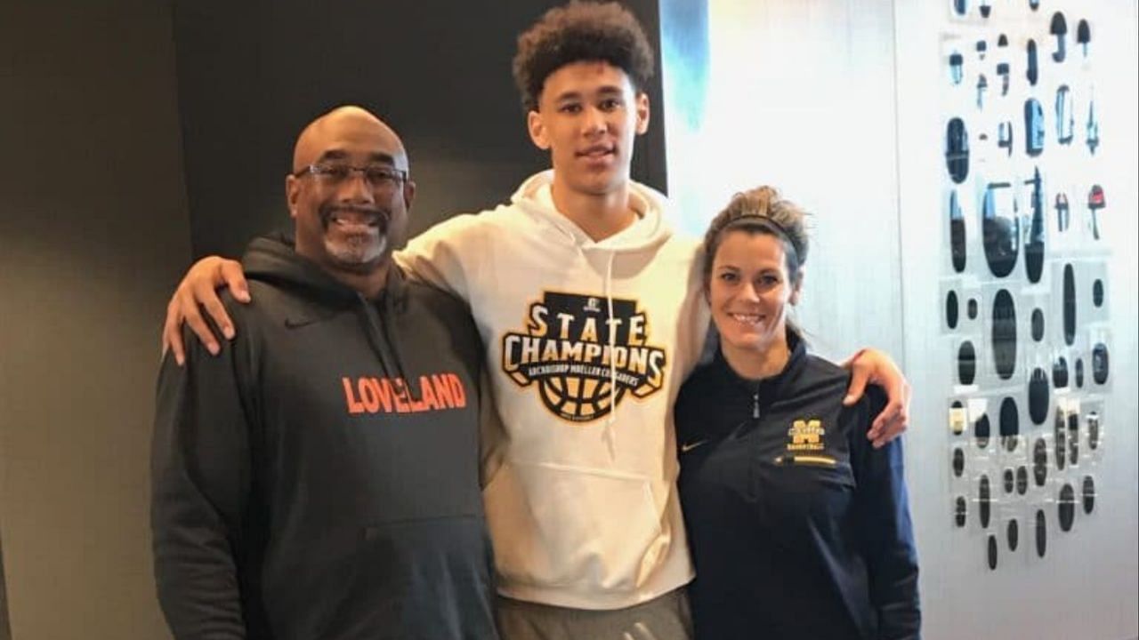 Jaxson Hayes (C) with his father Jonathan Hayes and mother Kristi (Kinne) Hayes