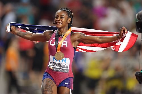 Sha'Carri Richardson celebrates after winning the Women's 100m Final during the 2023 World Athletics Championships in Budapest, Hungary.