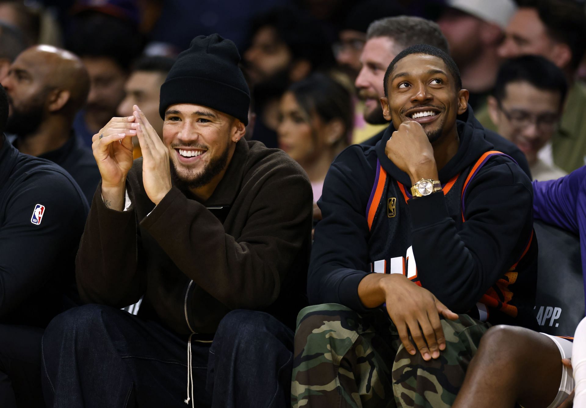 Devin Booker (left) and Bradley Beal of the Phoenix Suns on the bench against the LA Lakers