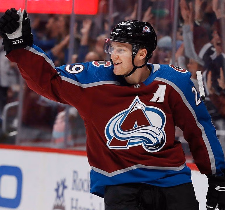Who are Nathan MacKinnon's parents, Graham and Kathy MacKinnon?