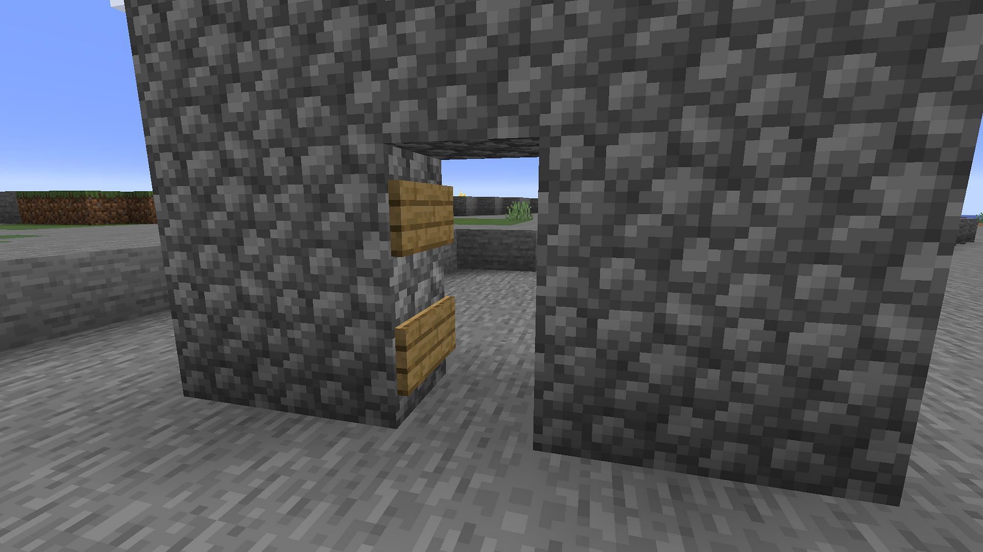 Signs can be used to ensure Minecraft fans can pass through a painting door (Image via Mojang)