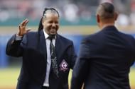 Former Cleveland player Manny Ramirez reacts after the ceremonial first pitch after being inducted into the Cleveland Guardians Hall