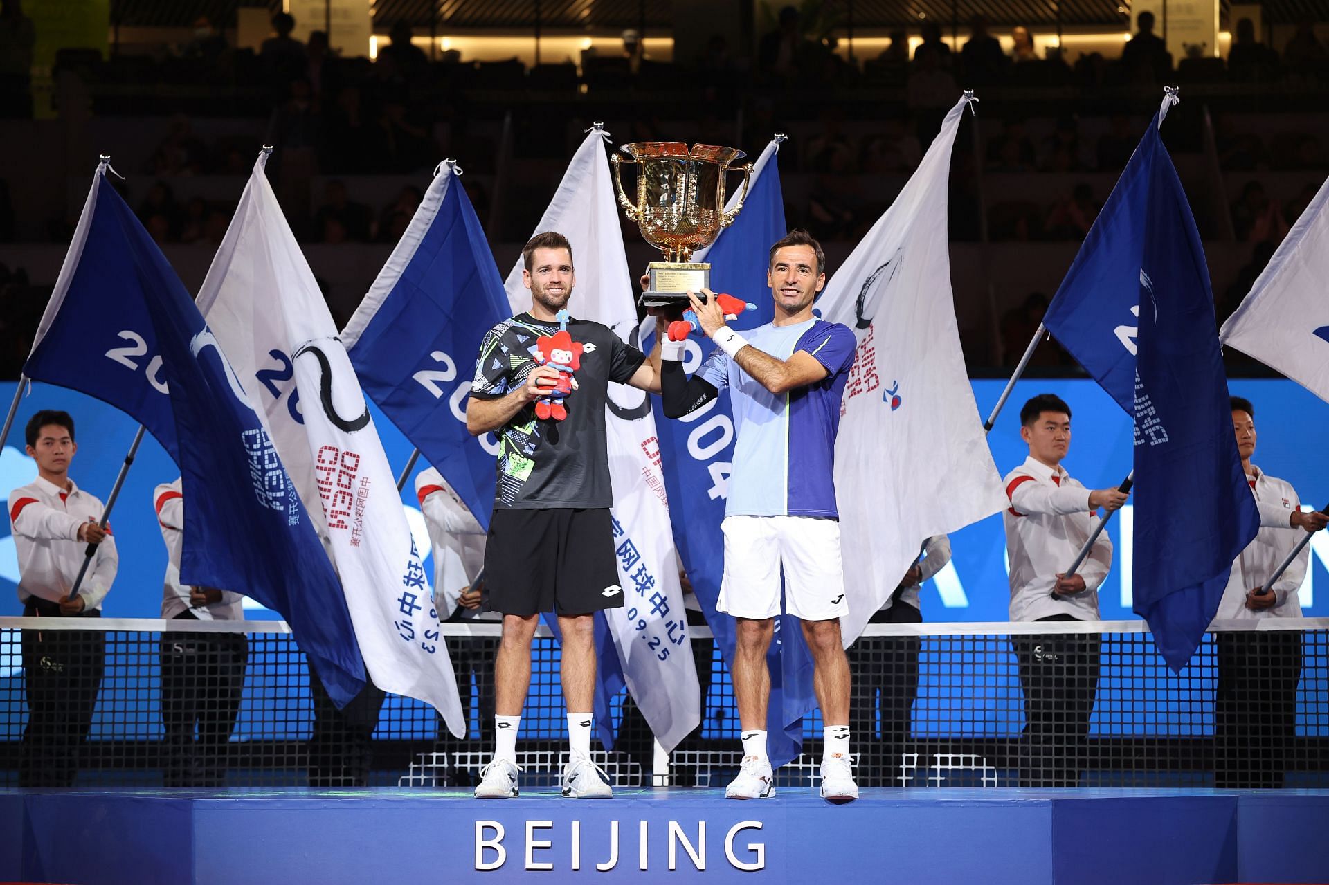 Ivan Dodig and Austin Krajicek with the men&#039;s doubles winners&#039; trophy in Beijing
