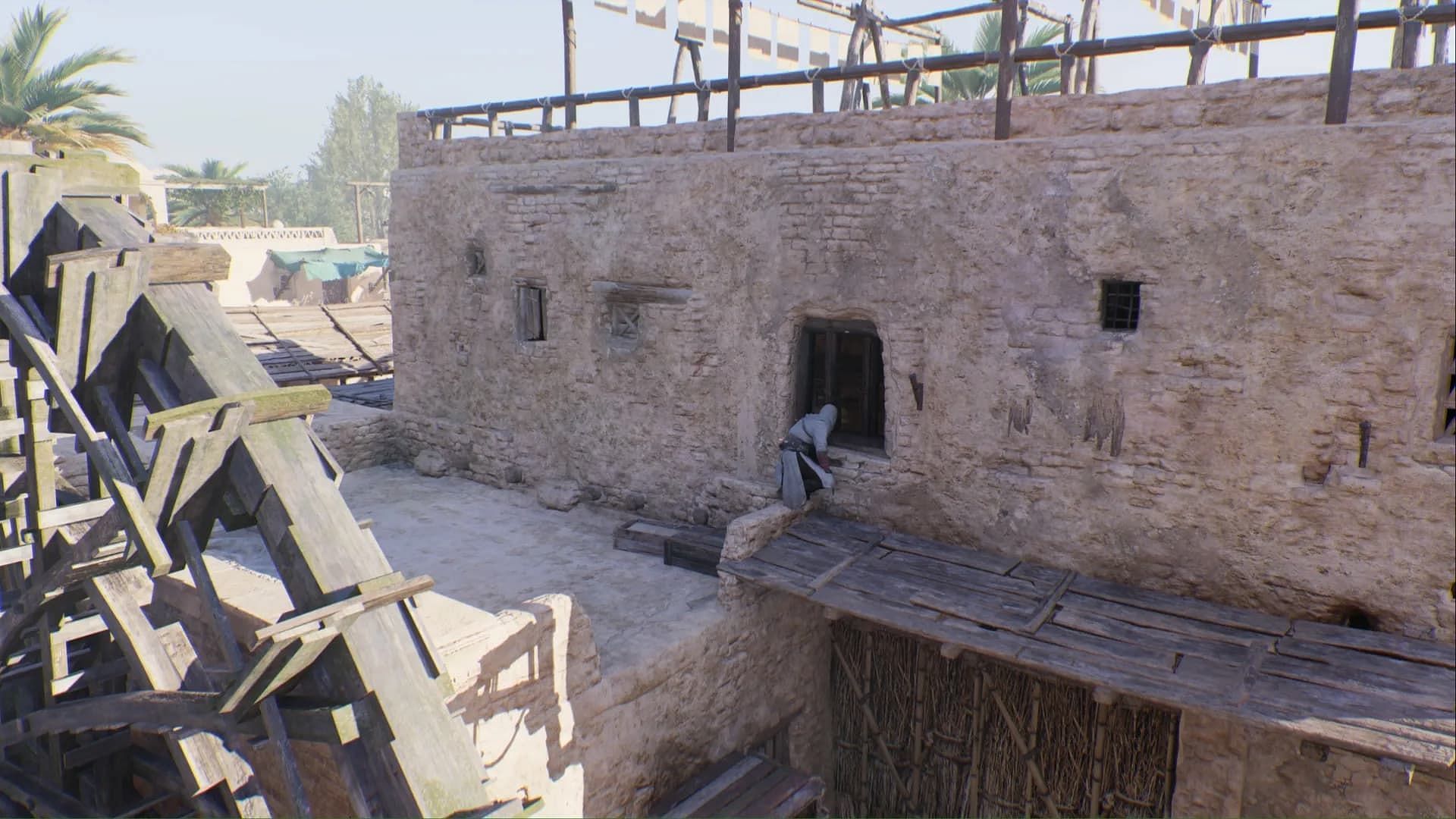 Look through the window behind the water wheel (Image via Ubisoft)