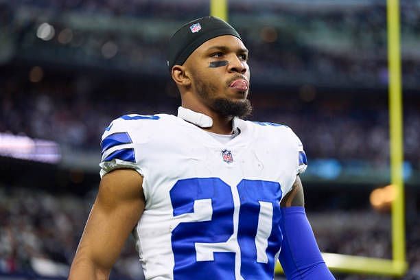 Running back Tony Pollard of the Dallas Cowboys looks on before kickoff against the Philadelphia Eagles at AT&amp;T Stadium on December 24, 2022 in...