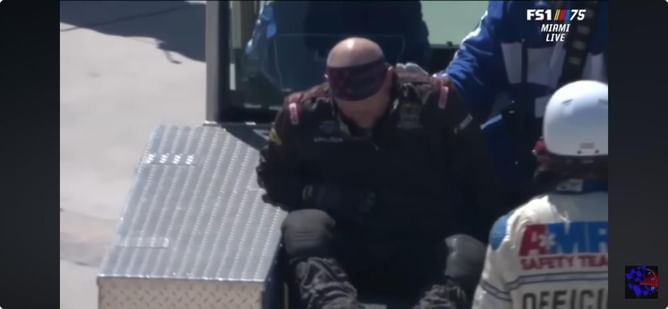 WATCH: NASCAR Truck Series driver strikes crew members on pit road, sends tire changer to hospital
