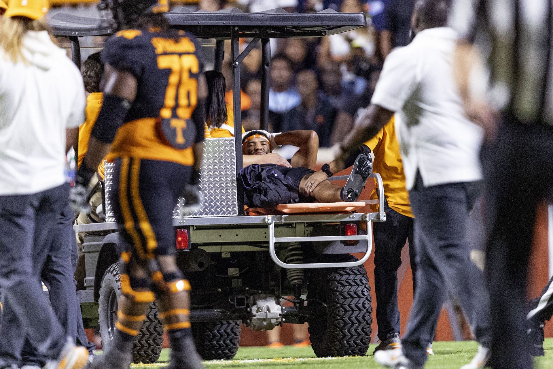 Tennessee wide receiver Bru McCoy (15) is taken from the field