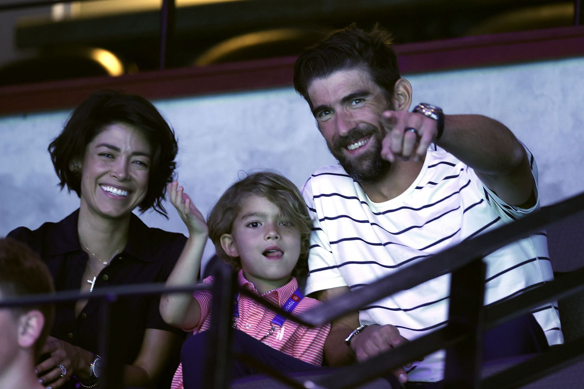 Michael Phelps along with wife Nicole Johnson watch the men&#039;s 400m Individual Medley at the 2021 U.S. Olympic Trials in Omaha, Nebraska