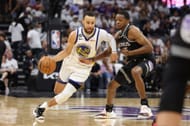 Steph Curry of the Golden State Warriors and De'Aaron Fox of the Sacramento Kings