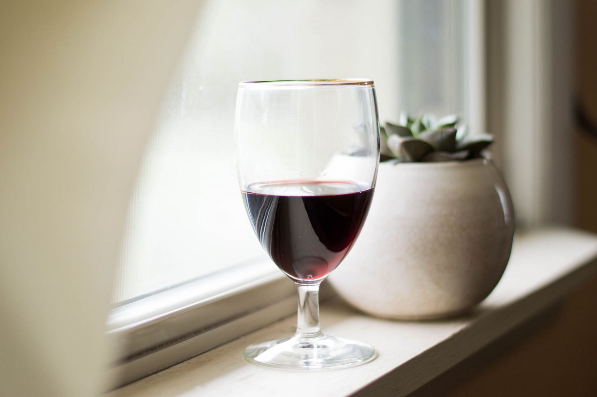 Benefits of using red wine for grey hair (Image sourced via Pexels / Photo by Photo by Chitokan C)