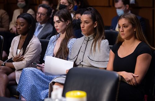 Simone Biles, McKayla Maroney, Aly Raisman, and Maggie Nichols arrive to testify during a Senate Judiciary hearing about the Inspector General's report on the FBI handling of the Larry Nassar investigation of sexual abuse, in Washington, DC.