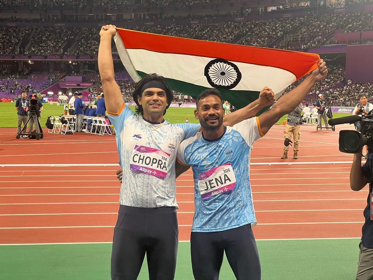 Neeraj Chopra and Kishore Kumar Jena pose together after winning the gold and silver in the Javelin Throe event