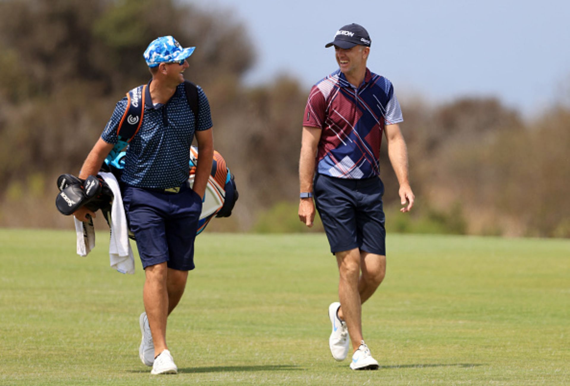 McAlpine and Martin Laird (Image via Getty).