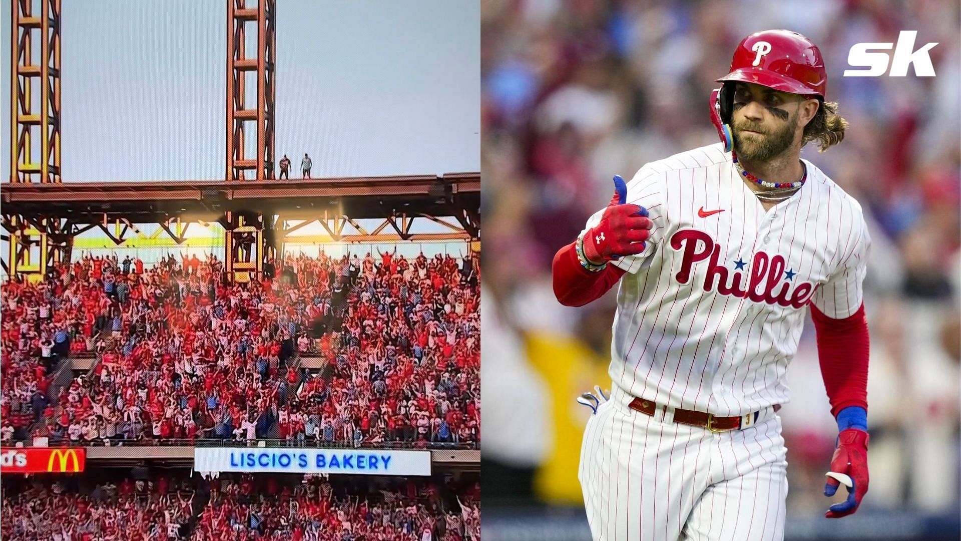 Fans have gone crazy over two people seen standing on the roof of the stadium during the Phildelphia Phillies and Atlanta Braves game