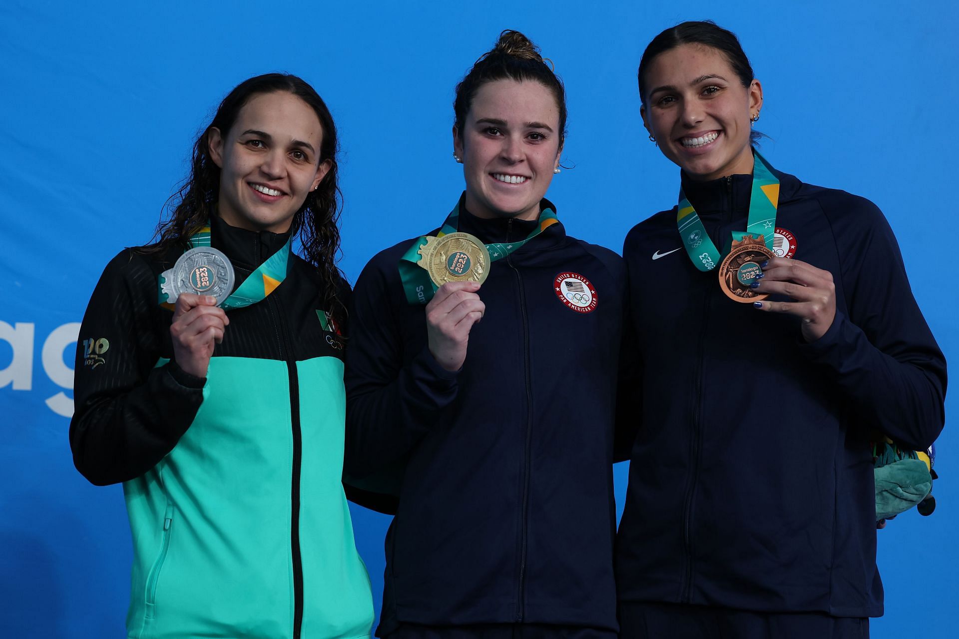 Silver medalist Maria Mata Cocco of Mexico, gold medalist Dakota Luthe,r and bronze medalist Kelly Pash of United States pose on the podium of Women&#039;s 200m Butterfly at 2023 Pan Am Games in Santiago, Chile.