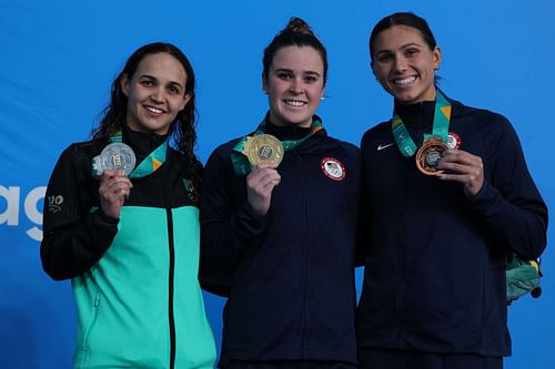 Silver medalist Maria Mata Cocco of Mexico, gold medalist Dakota Luthe,r and bronze medalist Kelly Pash of United States pose on the podium of Women's 200m Butterfly at 2023 Pan Am Games in Santiago, Chile.