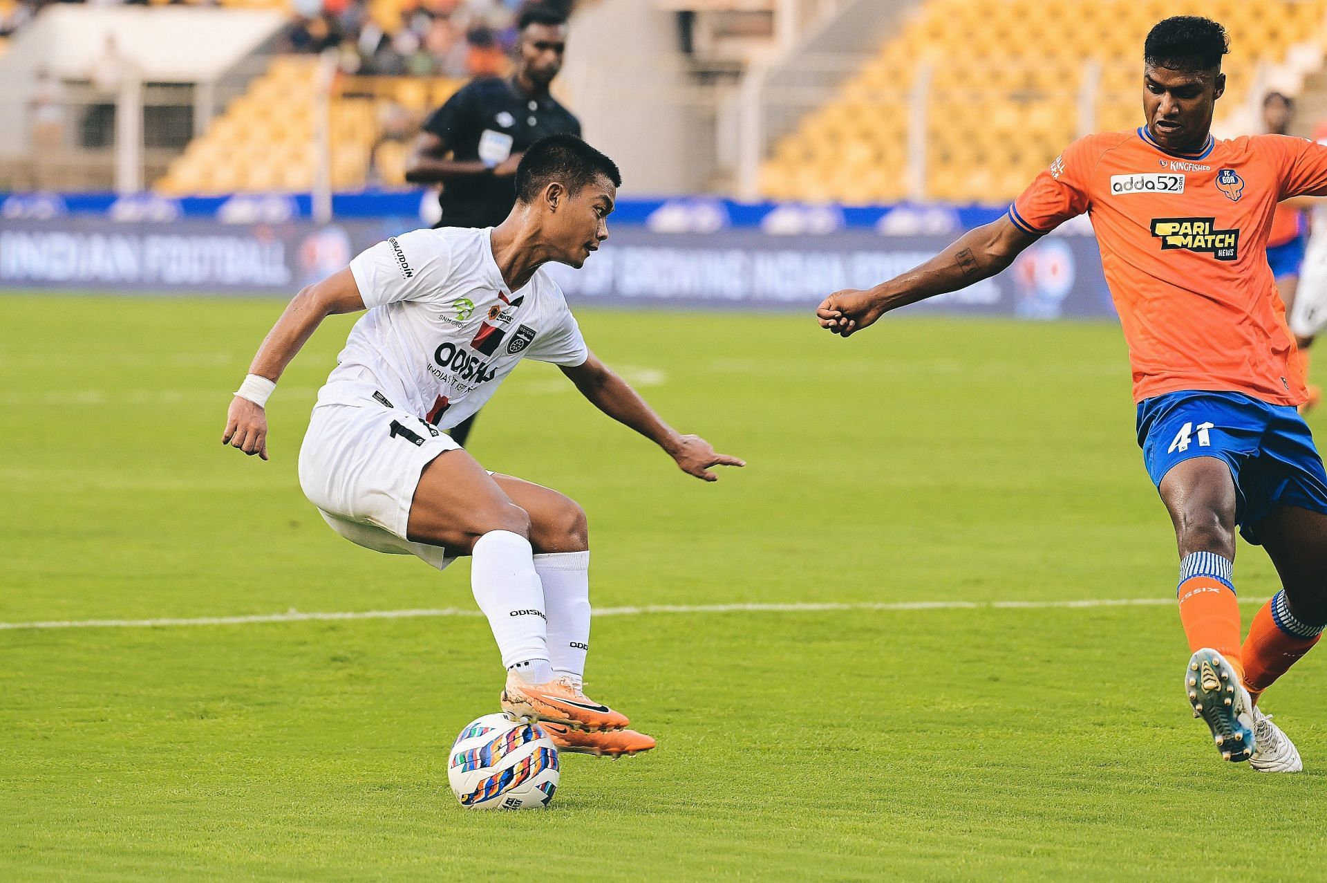 Odisha FC and FC Goa players vying for the ball.