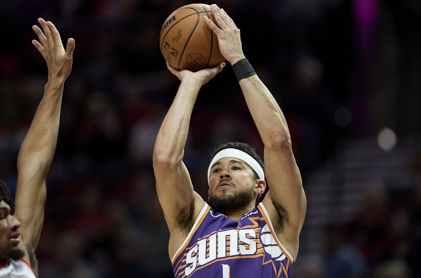 LeBron James congratulated Devin Booker post-game with a signed